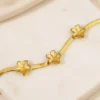 Pulseras para mujer de moda diseño malla flexible con apliques florales de acero inoxidable y baño de oro 18k