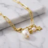 pulsera-para-mujer-B02378G-de-eslabones-con-dijes-y-perlas-en-acero-inoxidable-y-baño-de-oro-18k Radiantes pulseras mujeres B02378G